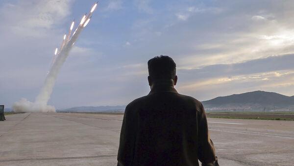 Kim Jong Un watches as North Korea carries out missile tests