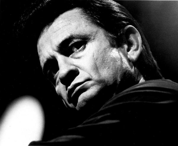 Black and white photo of Johnny Cash. 