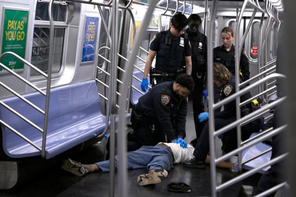 EMS workers performing CPR on Jordan Neely