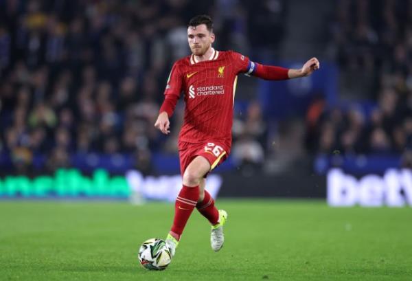 Andrew Robertson of Liverpool runs with the ballduring the Carabao Cup Fourth Round match between Brighton & Hove Albion and Liverpool