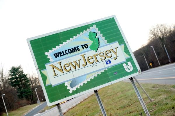 Welcome to New Jersey sign displayed on the side of Interstate 80 in Knowlton Township, NJ