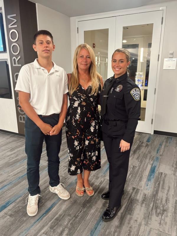 Christine Lemm and her son and daughter in uniform.