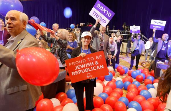 Sari Dennis, center, stands among balloons after a live satellite video speech by Do<em></em>nald Trump during the Republican Jewish Coalition annual leadership summit Thursday, Sept. 5, 2024, in Las Vegas.