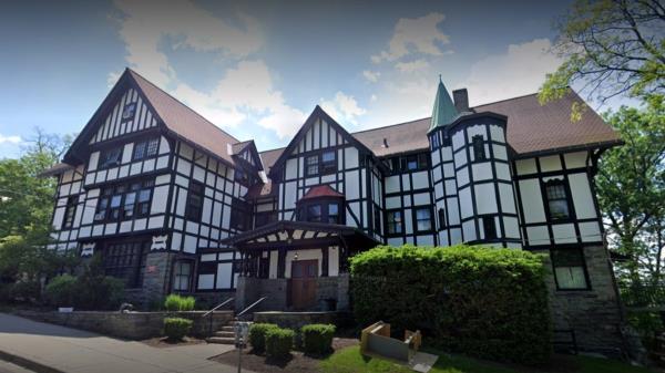 Spray paint is seen on the exterior of Cornell University’s Chi Phi fraternity house earlier this week.