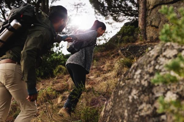 couple hiking in woods