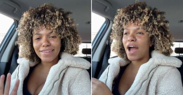 Young woman sat in car