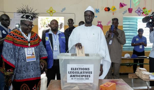 Senegal's Presidential Bassirou Diomaye Faye casts his ballot during the early legislative election, at a polling station in Ndiaganiao, Mbour, Senegal November 17, 2024. (REUTERS)