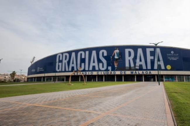 A banner with the words “Thank you Rafa” at the city’s athletics stadium